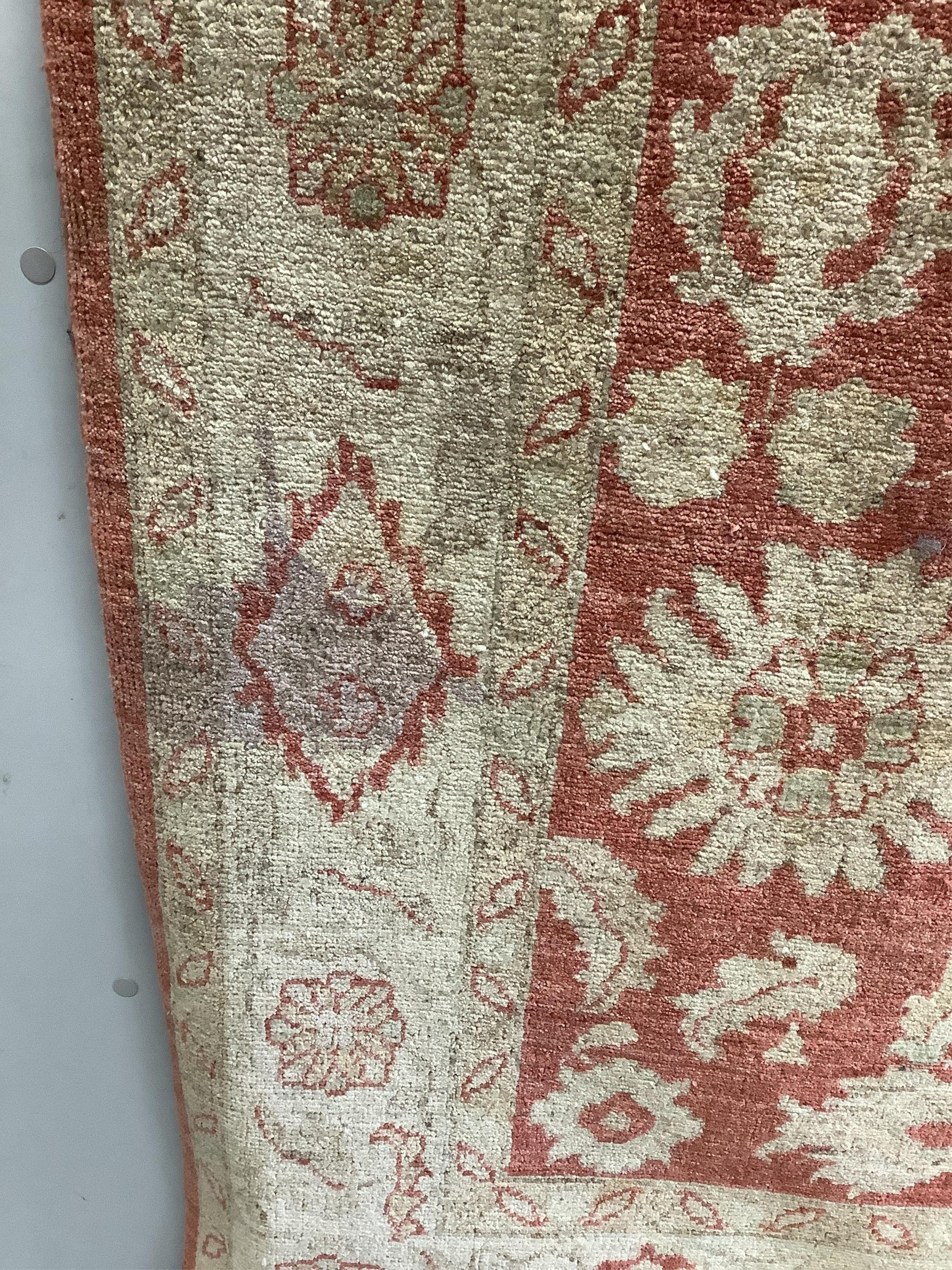 A Persian small carpet, 152 x 222cm. Condition - fair, red wine stain to one side